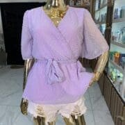 Swiss dot knot side pleated detail wrap blouse